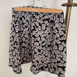 Black floral mini skirt